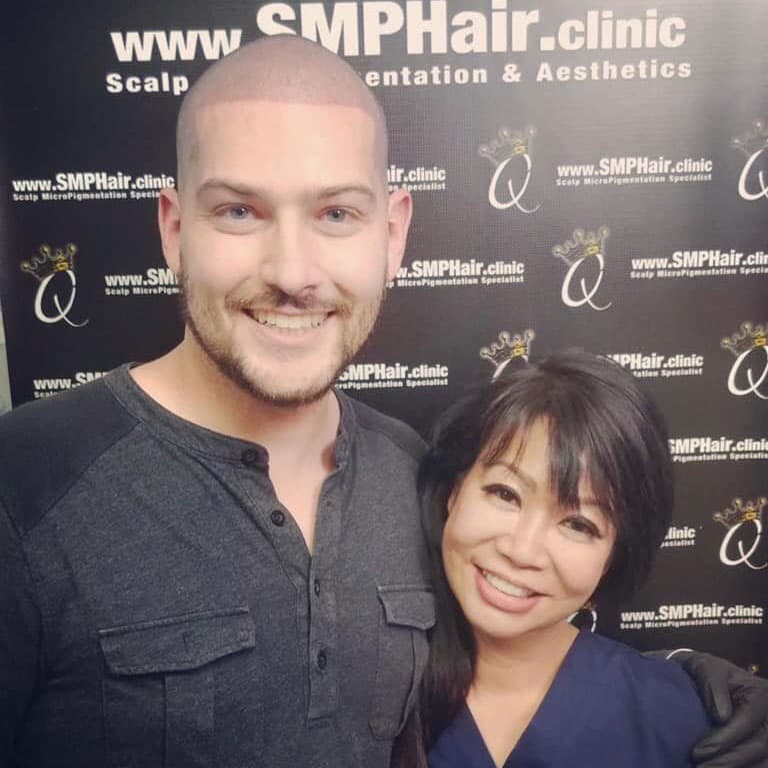 Smiling client with Elsie after SMP treatment.